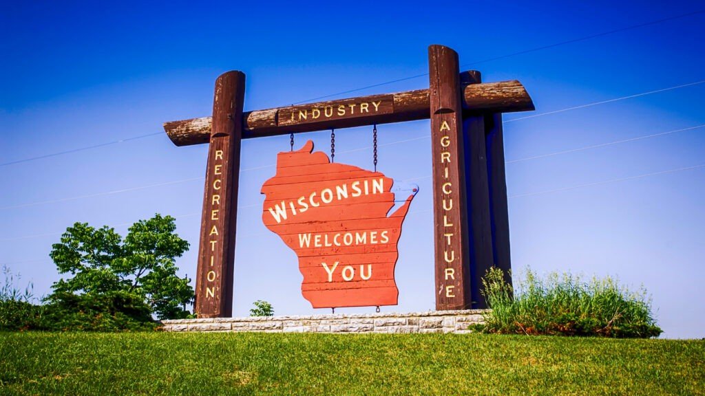 Wisconsin le da la bienvenida a su letrero con las palabras